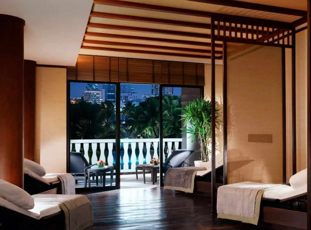 Bangkok hotel spa room overlooking hotel pool.