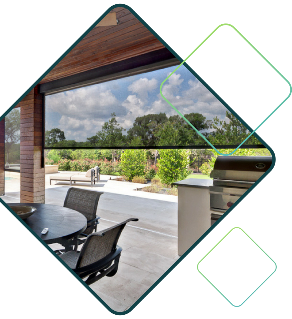 A black, see-through exterior screen pulled half way down on an outdoor patio.