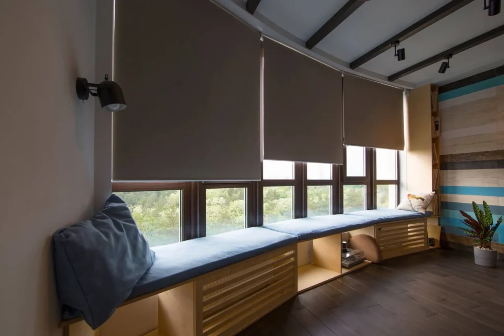 Motorized custom smart shades in interior of home office.