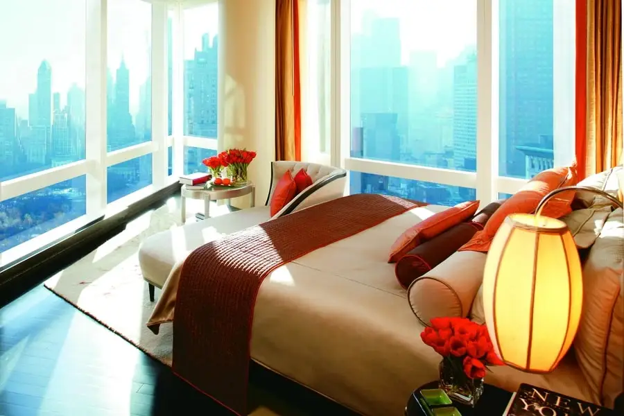 Corner bedroom suite at the Mandarin Hotel. Drapery designed by BTX.