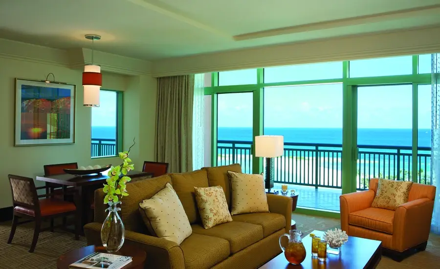 Living room of a suite in the Atlantis Hotel, with drapery designed by BTX.