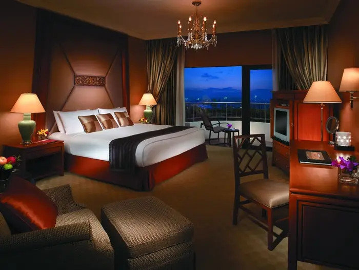 Shangri-La Hotel bedroom with custom drapery built by BTX.